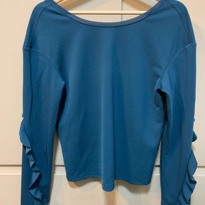 Top with ruffled sleeves